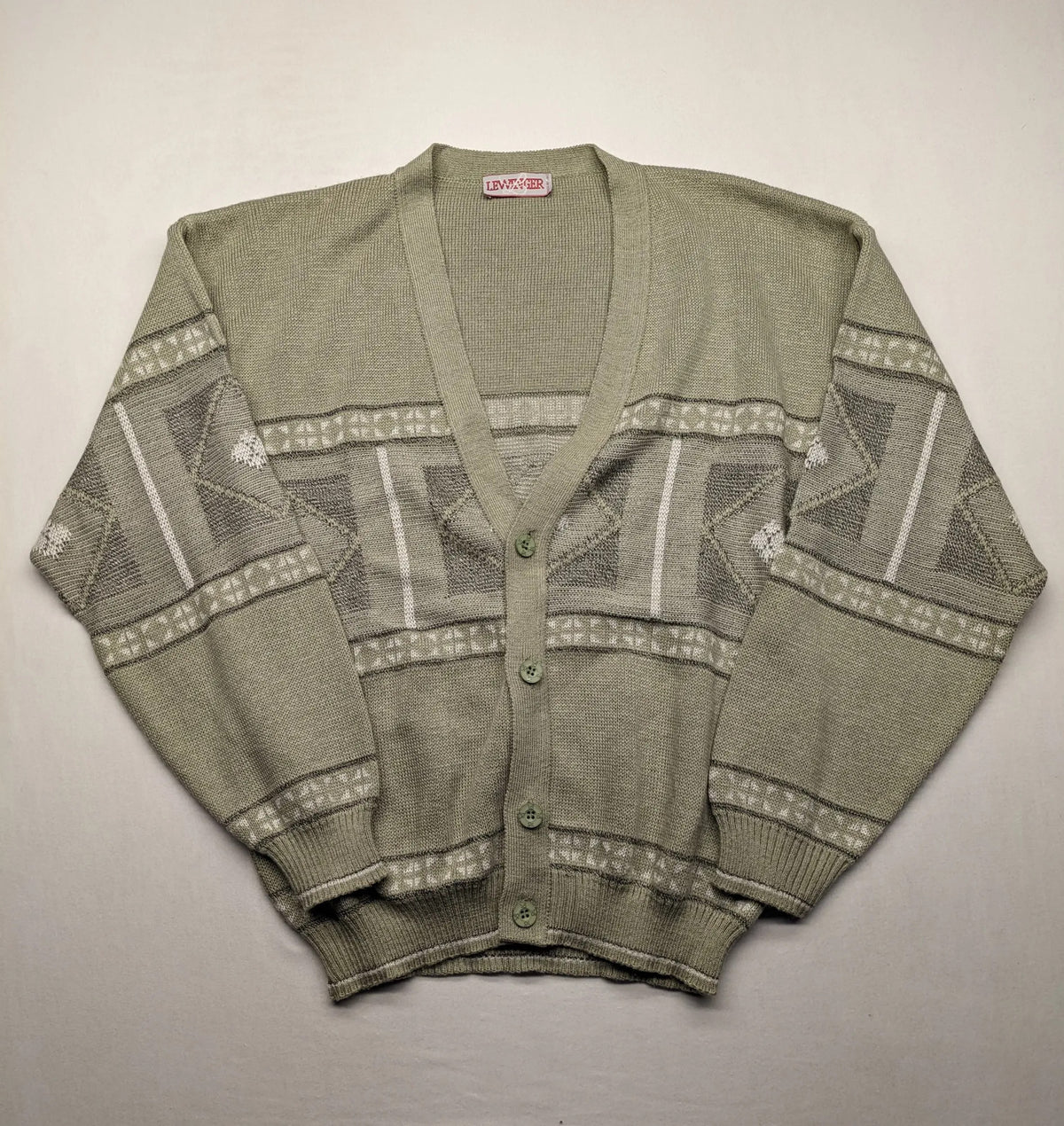 Lewträger cream and grey turtle neck jumper with geometric pattern and button placket.