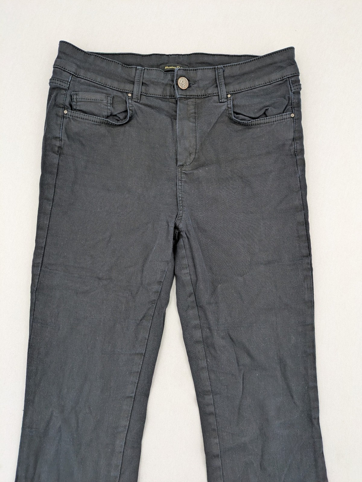 Massimo Dutti grey skinny fit jeans with coated finish and sleek silhouette.