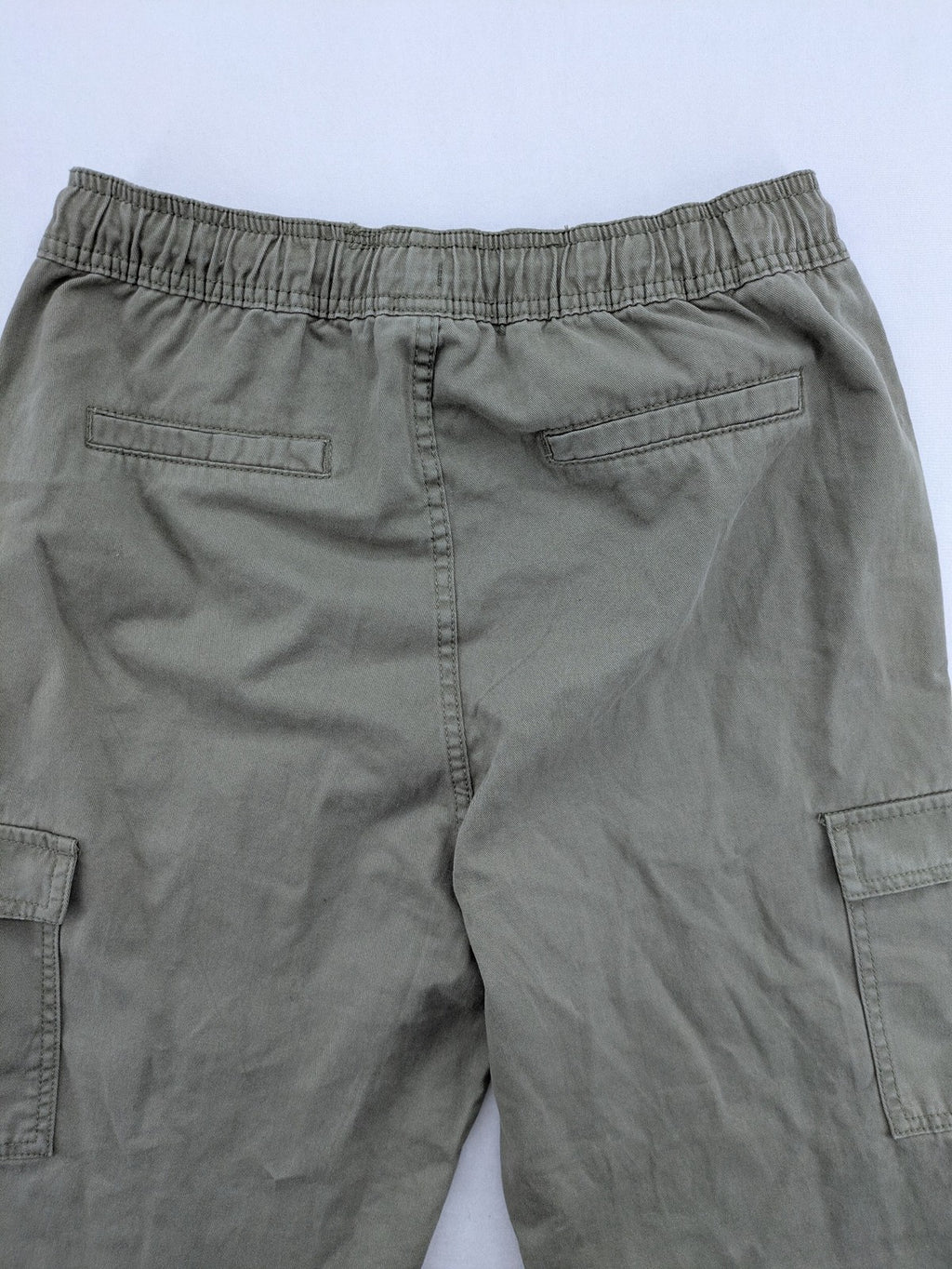 Y.F.K. khaki cargo pants with elastic cuffs, side pockets, and drawstring waistband.