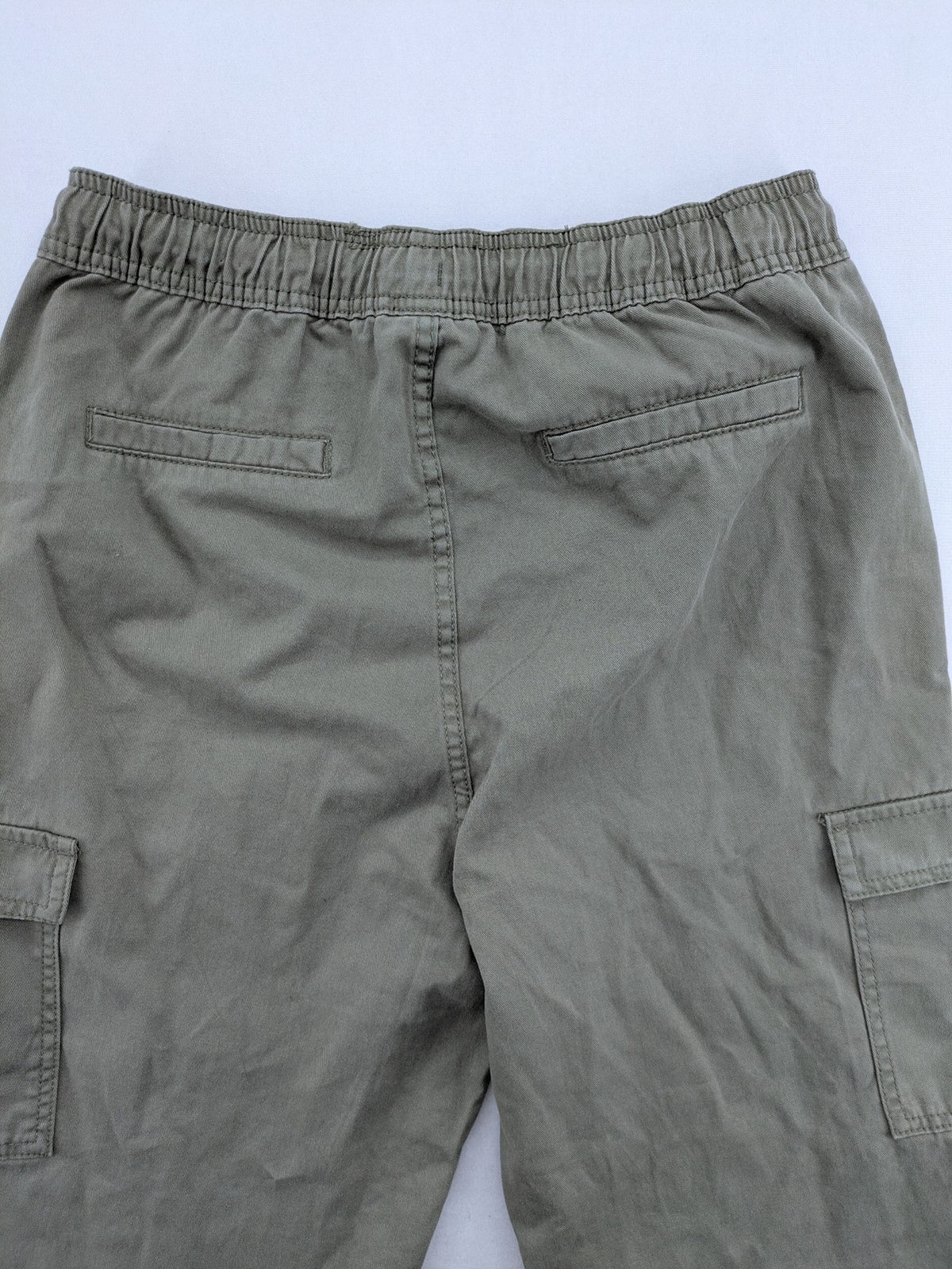 Y.F.K. khaki cargo pants with elastic cuffs, side pockets, and drawstring waistband.