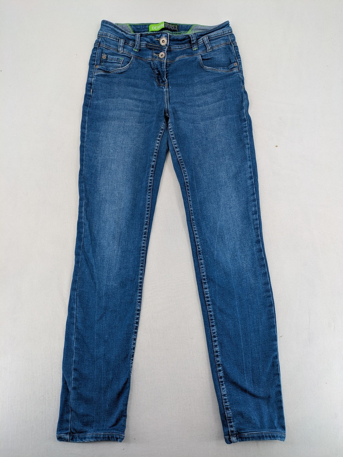 Cecil blue straight jeans with neon green accents and classic 5-pocket design.