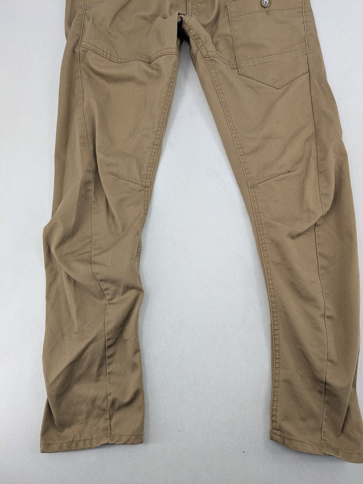 Crosshatch grey cargo pants with multiple pockets and durable cotton-polyester blend.