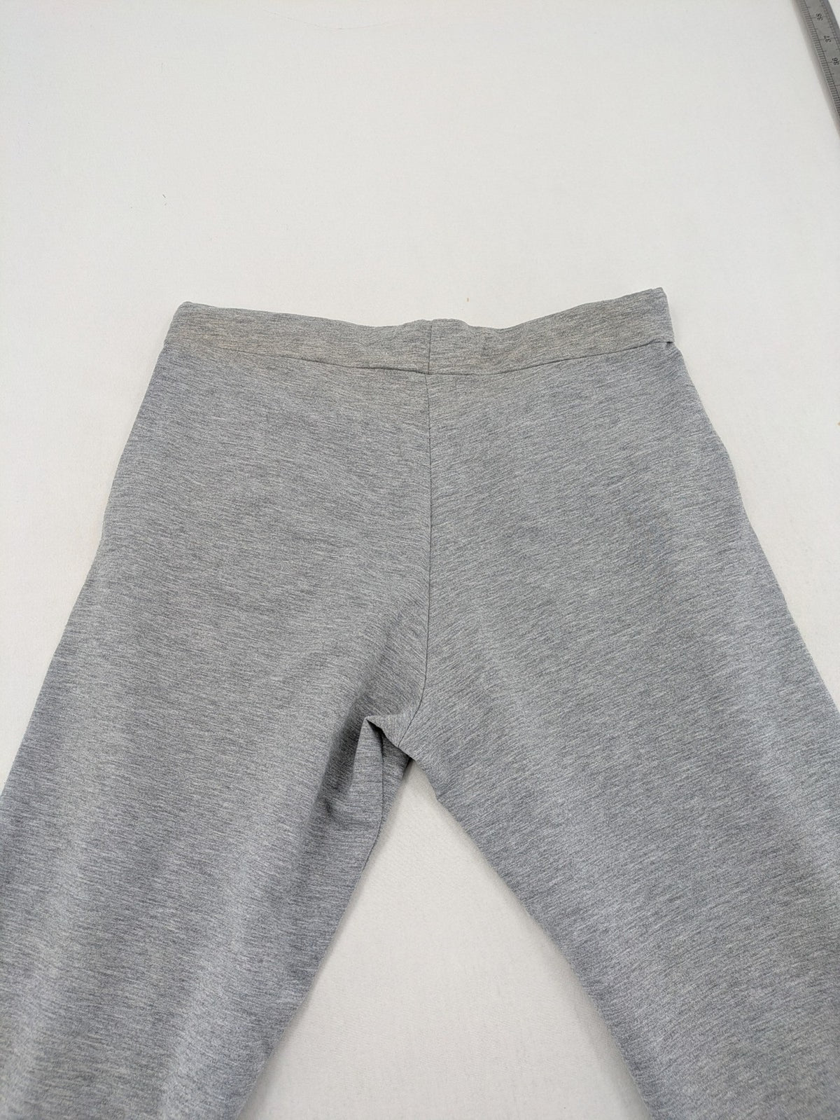 Falconhill grey jogging pants with elastic waistband, drawstring, and stylish black accent pockets.