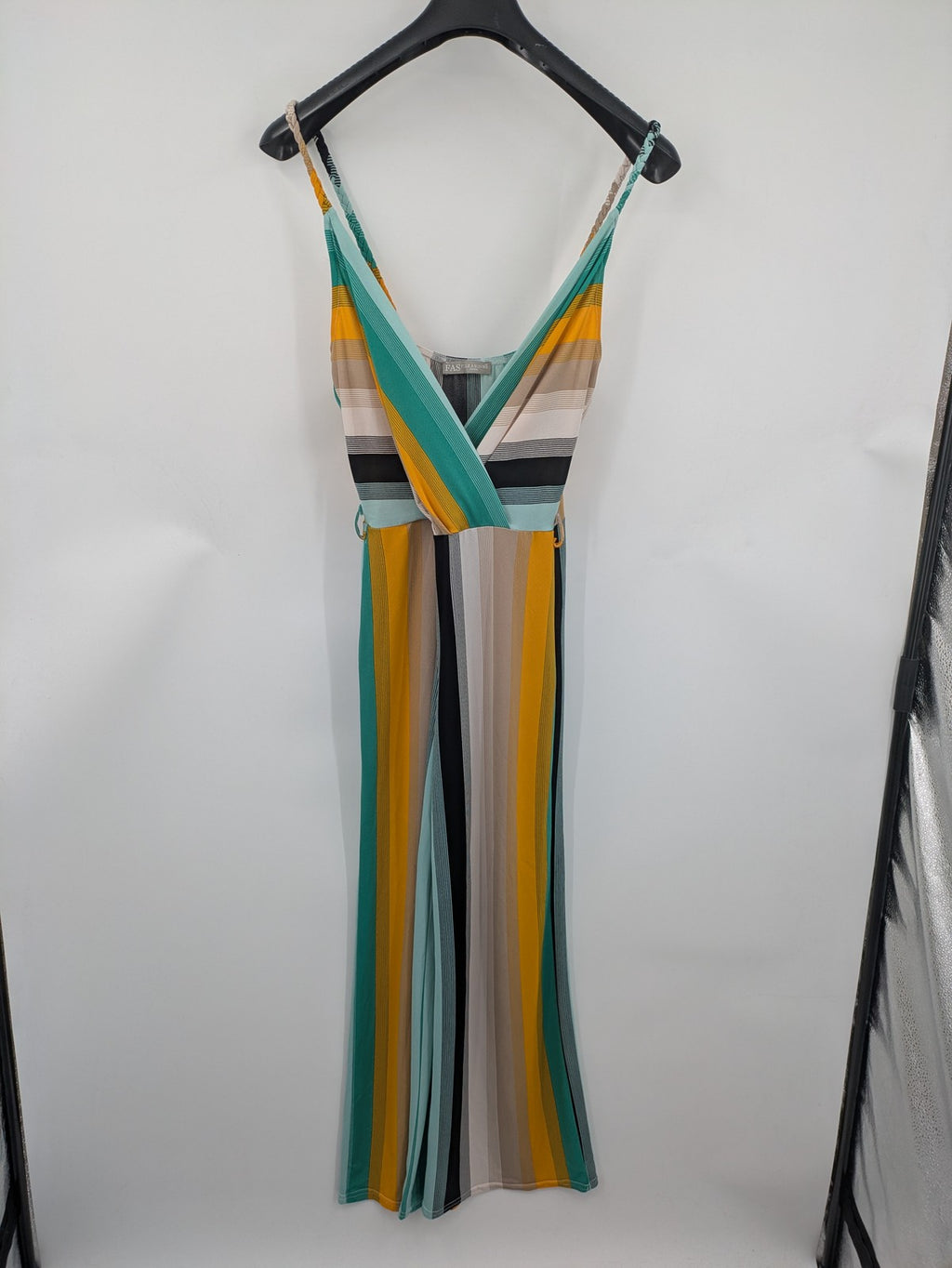 FAS beige and cream striped jumpsuit with deep V-neck and braided spaghetti straps.