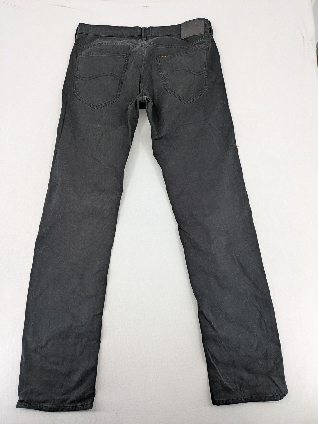 Lee straight jeans grey classic 5-pocket design with zip fly and subtle branding.