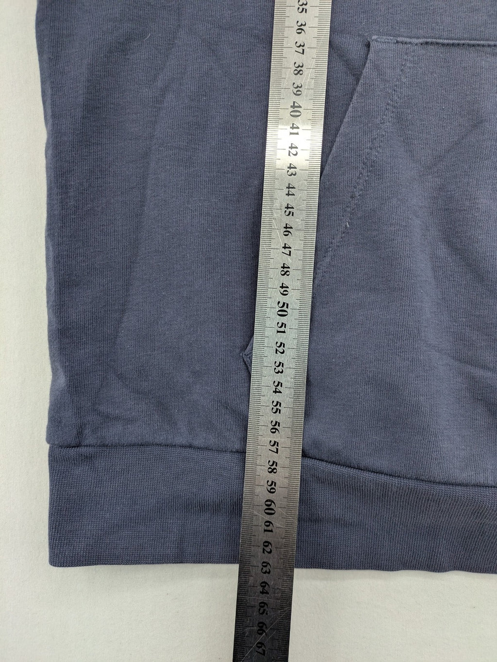 Hummel grey turtle neck jumper featuring large logo, kangaroo pocket, cotton blend material.