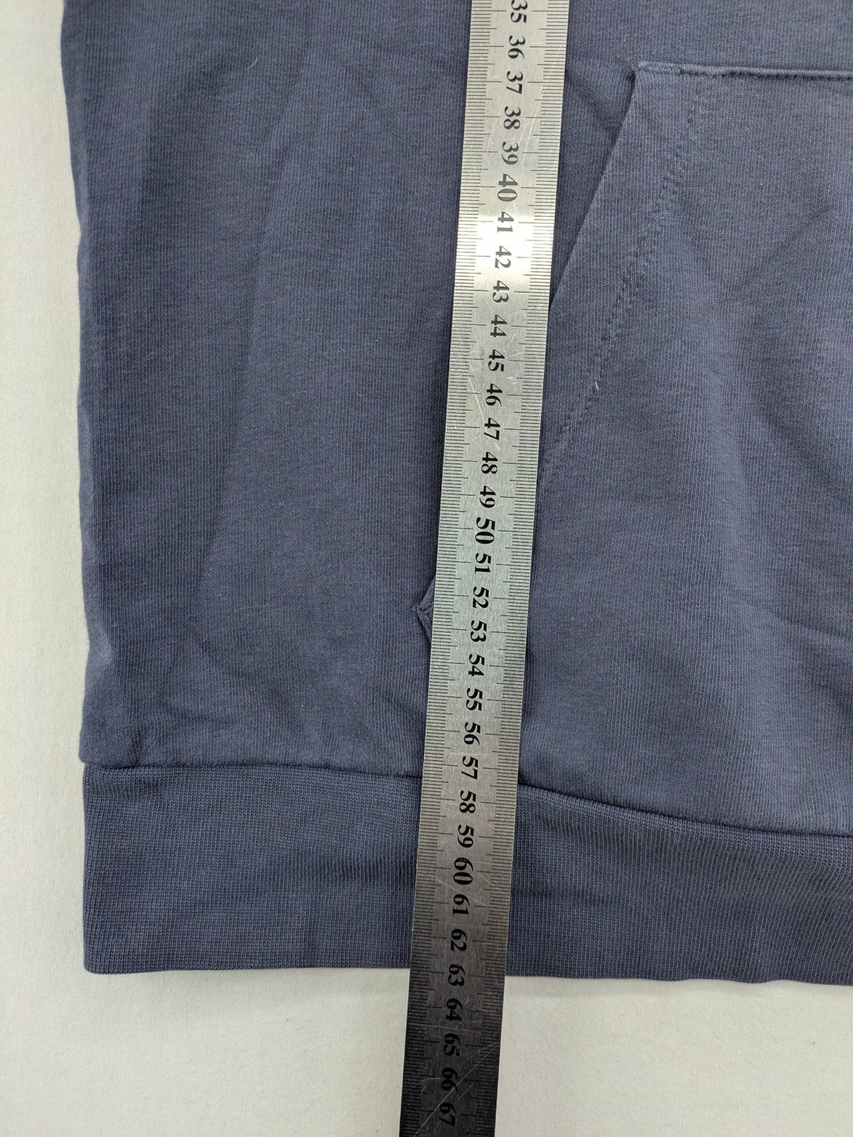 Hummel grey turtle neck jumper featuring large logo, kangaroo pocket, cotton blend material.