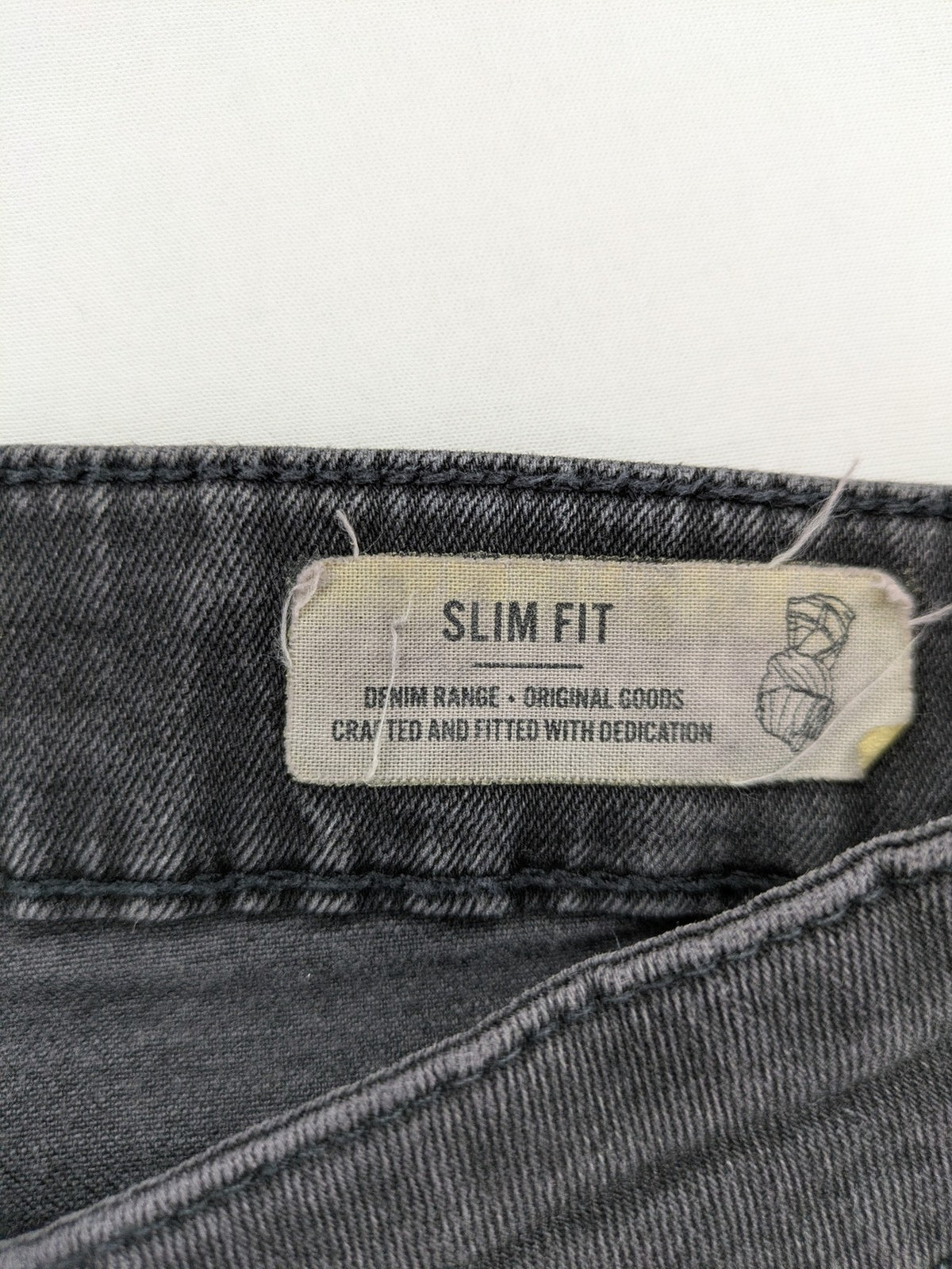 Only & Sons grey slim fit jeans with ripped details and open hem, stretch denim.
