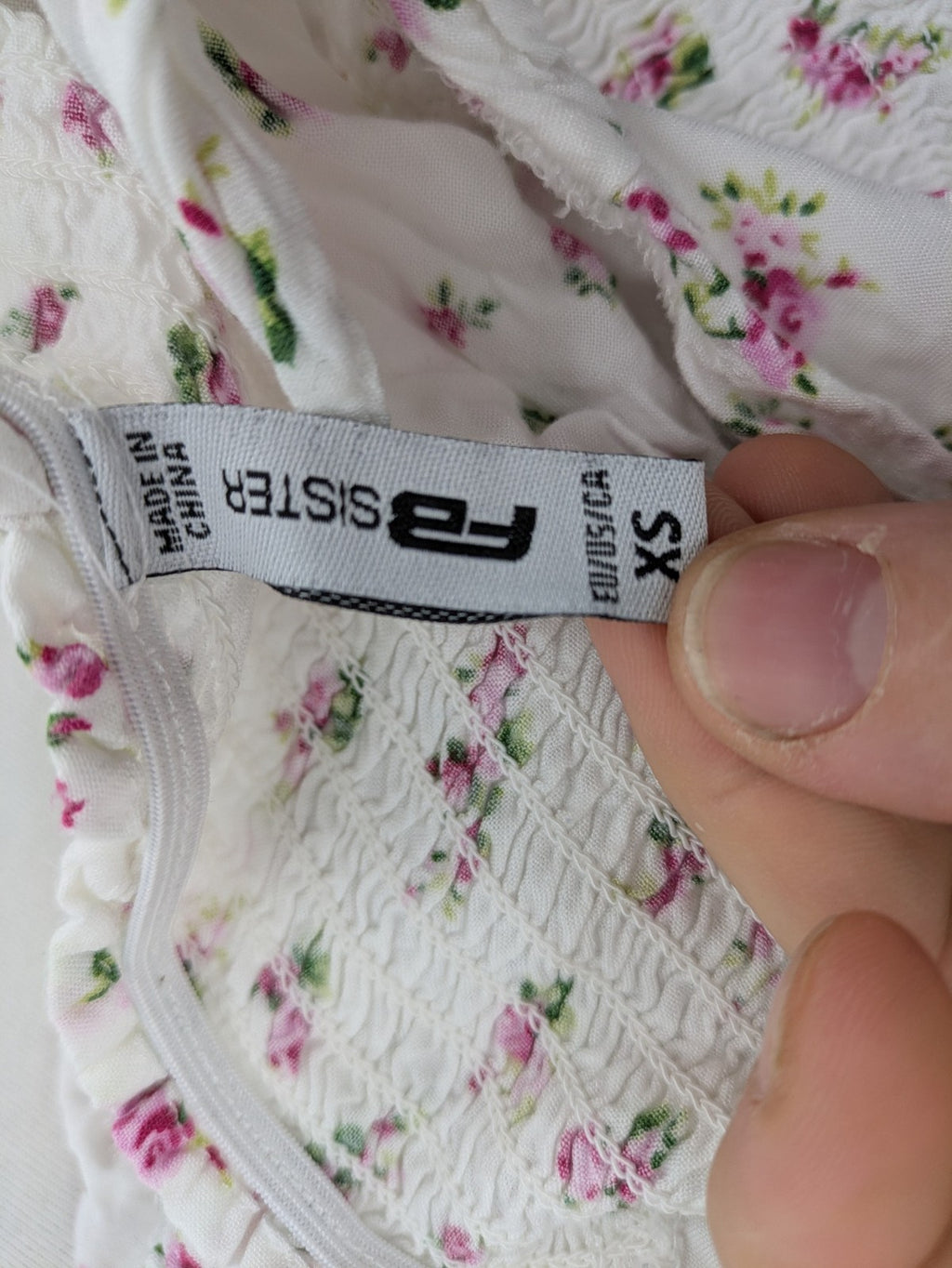 FB Sister floral playsuit white with pink flowers, smocked bodice, lightweight viscose material.