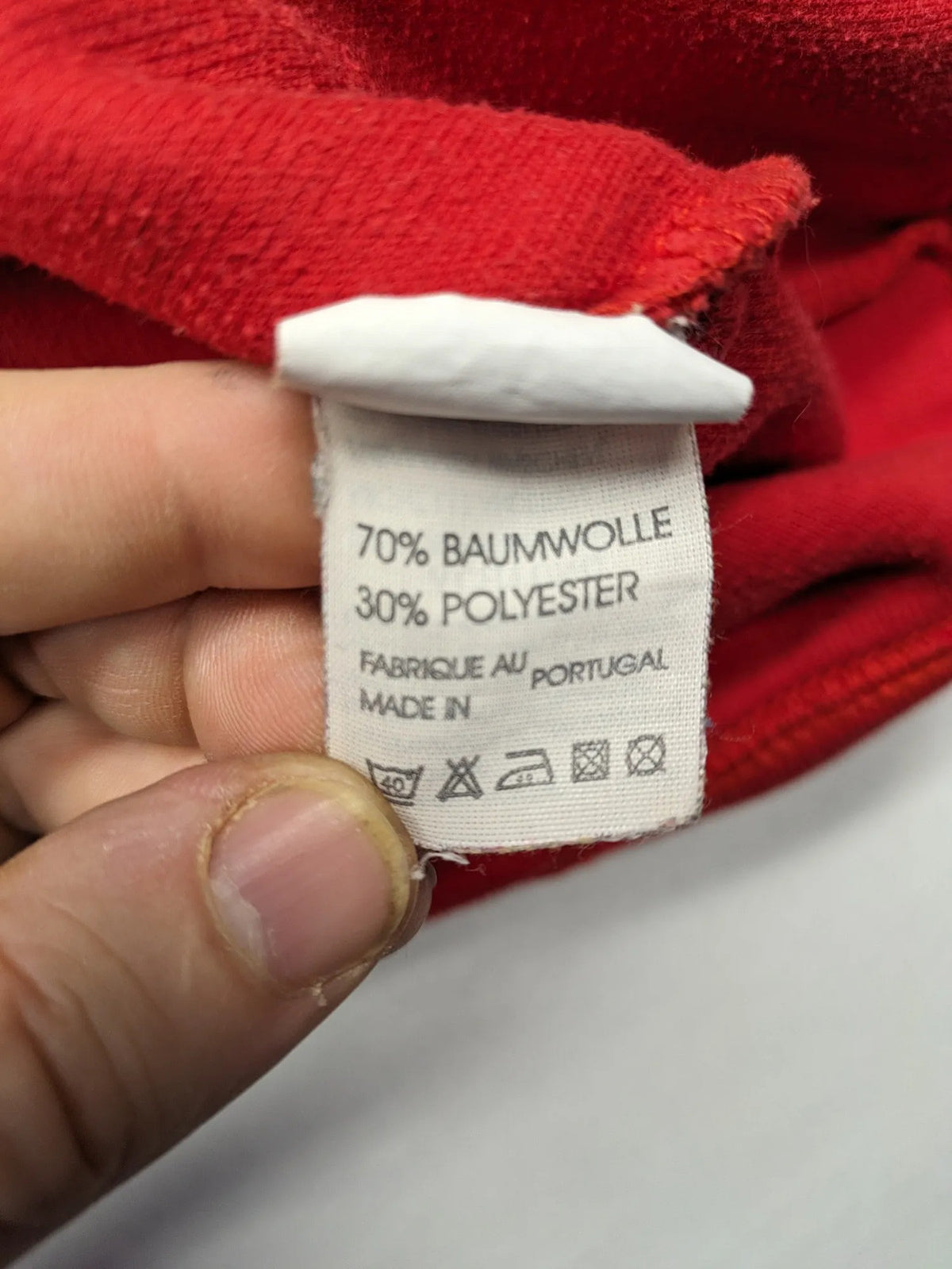 Wind Sportswear red turtle neck jumper with classic polo collar and zigzag stitching.