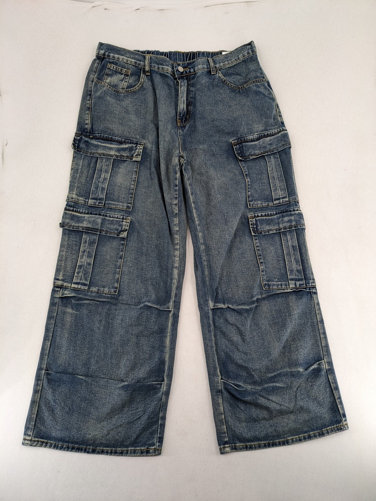 Baggy blue straight jeans wide leg with cargo pockets and elastic waistband.