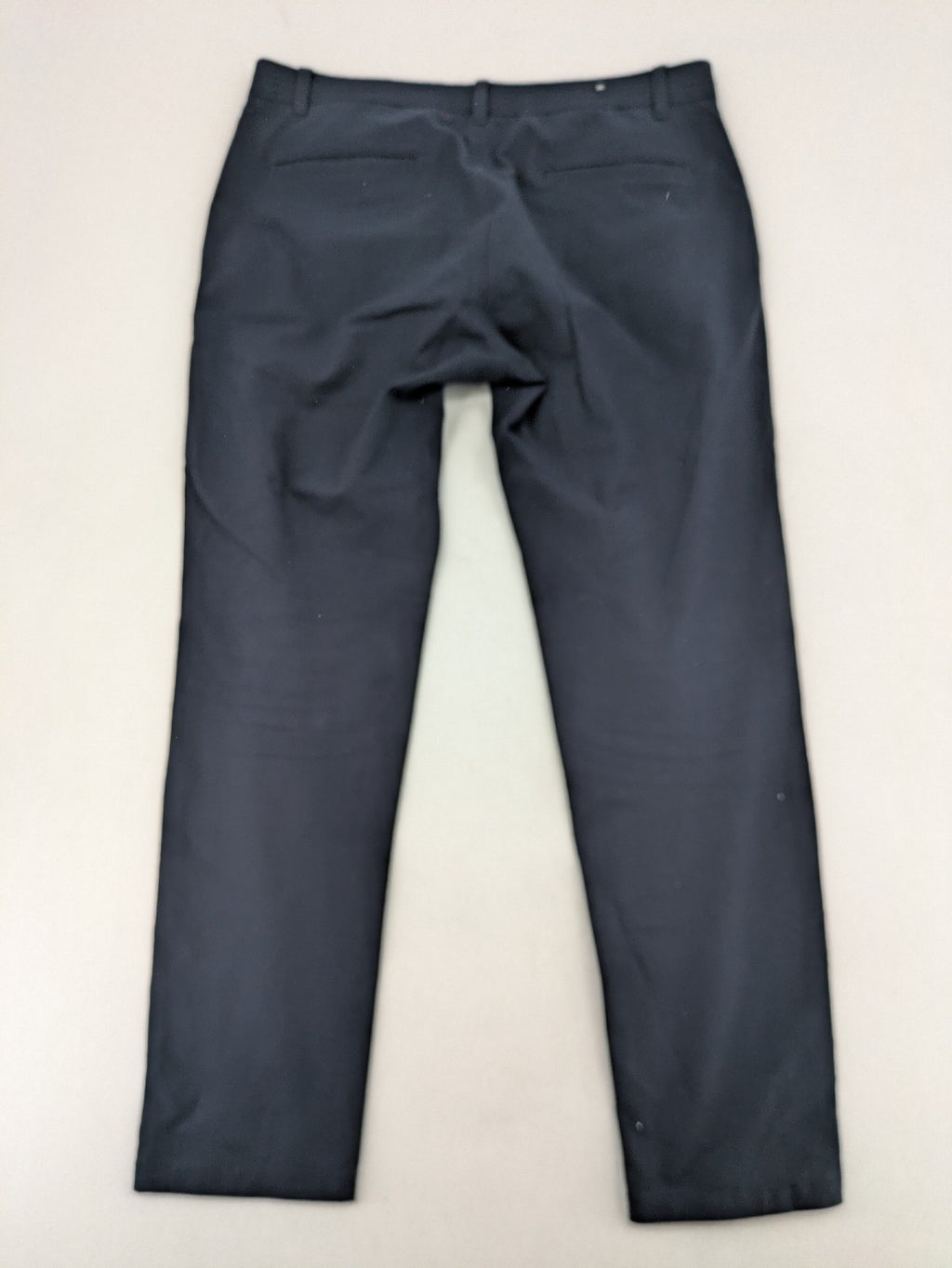 Zara navy chinos flat front design with stretch fabric for comfort and versatility.