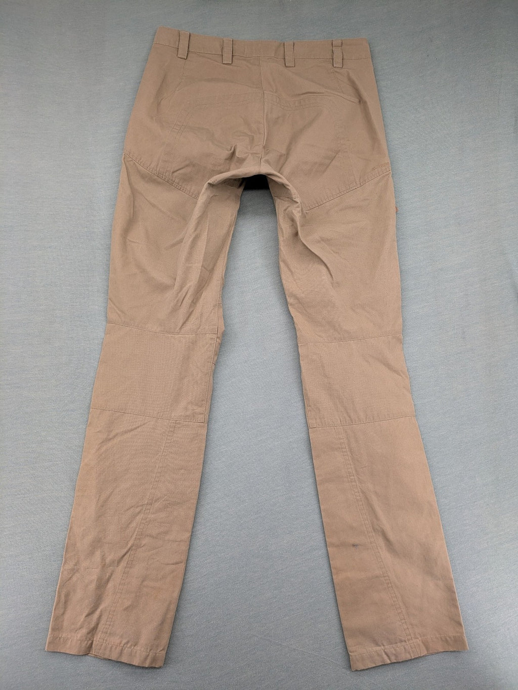 Fjällräven beige pants regular fit durable fabric outdoor style with logo detail.
