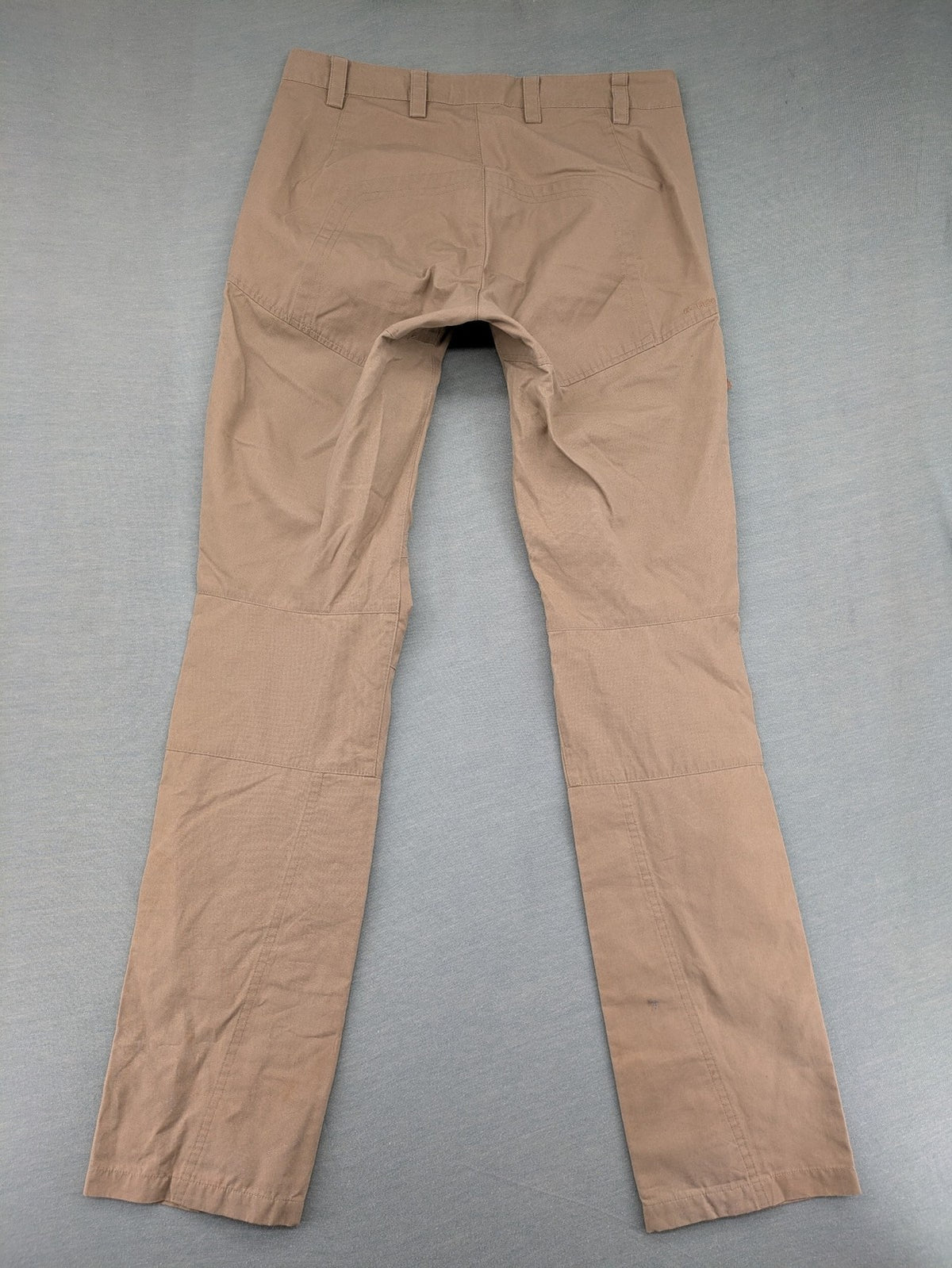 Fjällräven beige pants regular fit durable fabric outdoor style with logo detail.