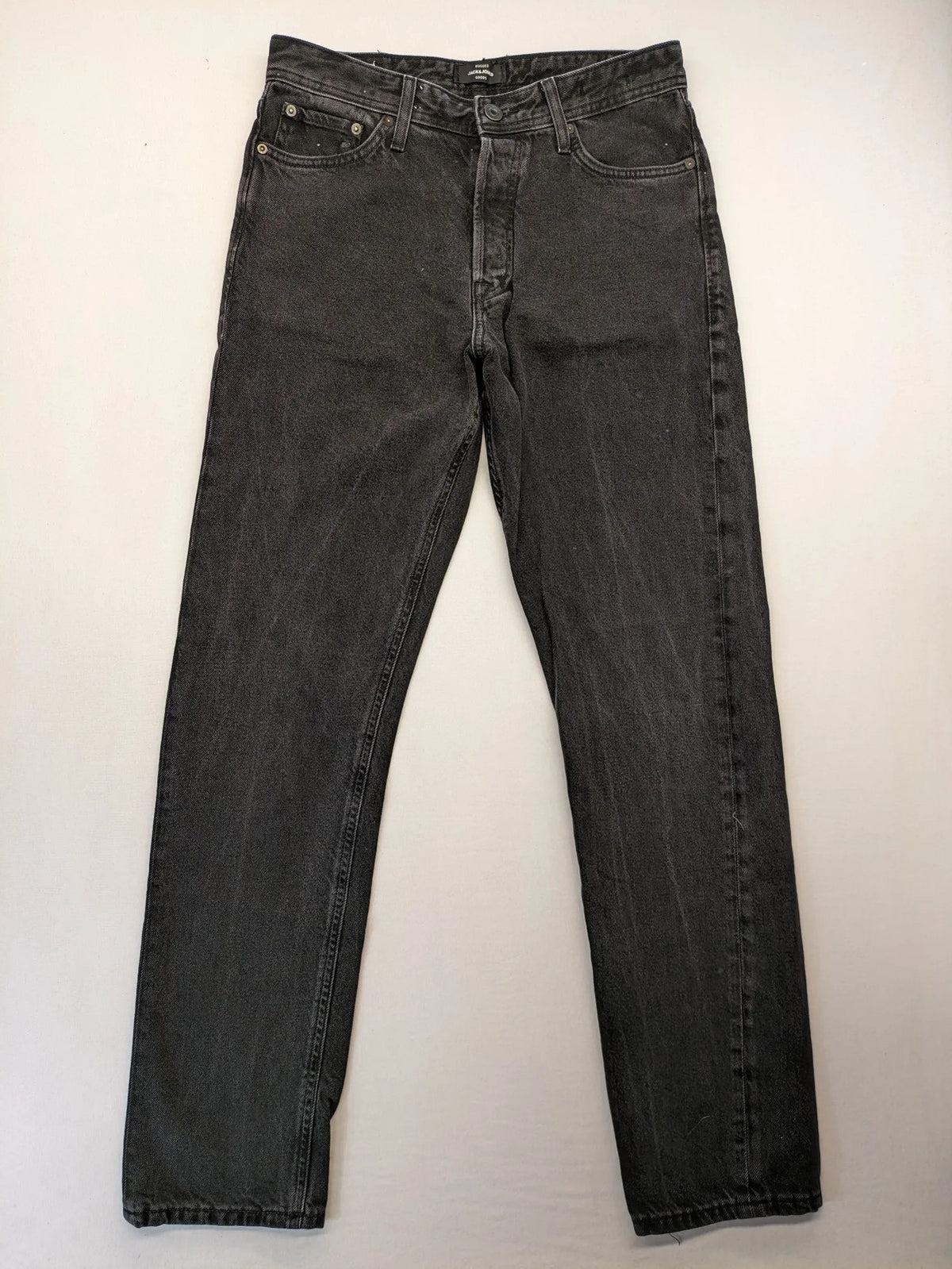 Jack & Jones grey loose fit jeans with classic button fly and 5-pocket design.