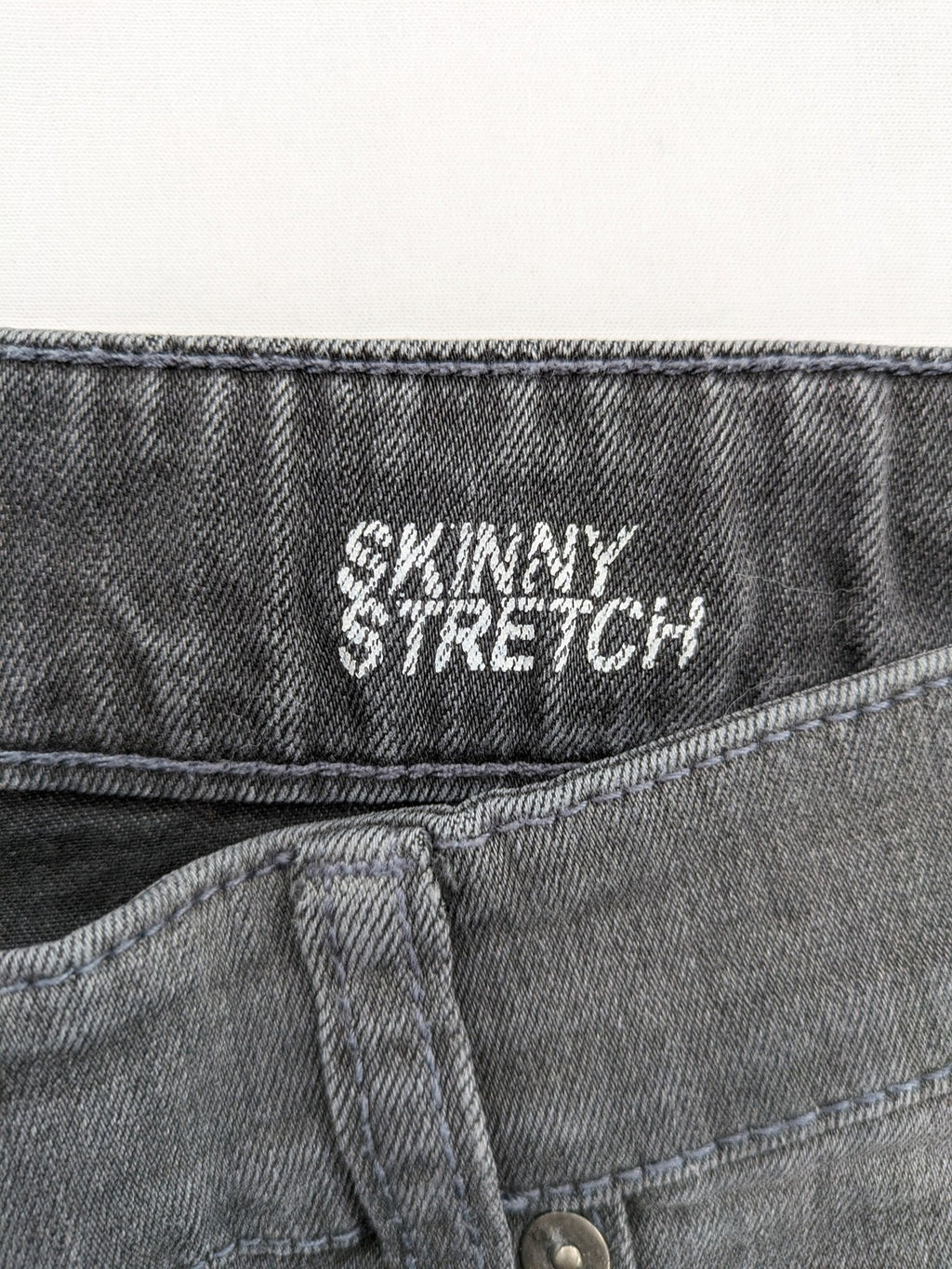 Clockhouse grey skinny fit jeans with biker ribbed panels and subtle distressed details.