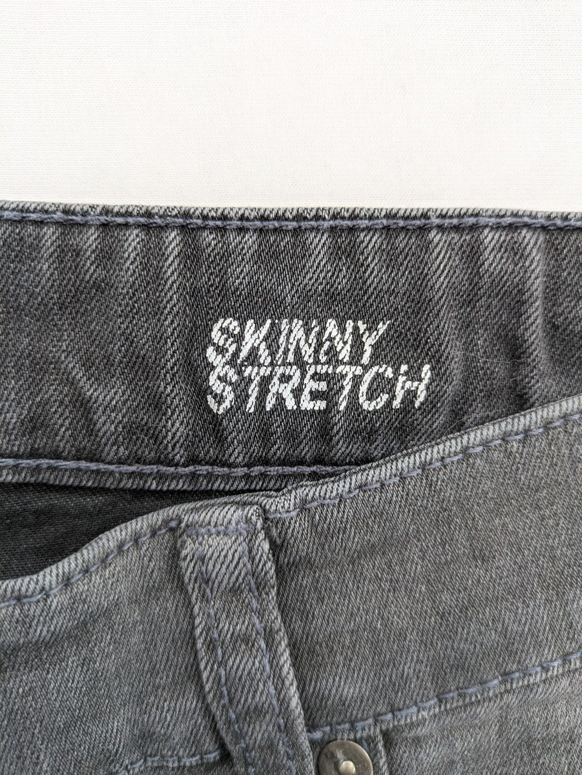 Clockhouse grey skinny fit jeans with biker ribbed panels and subtle distressed details.