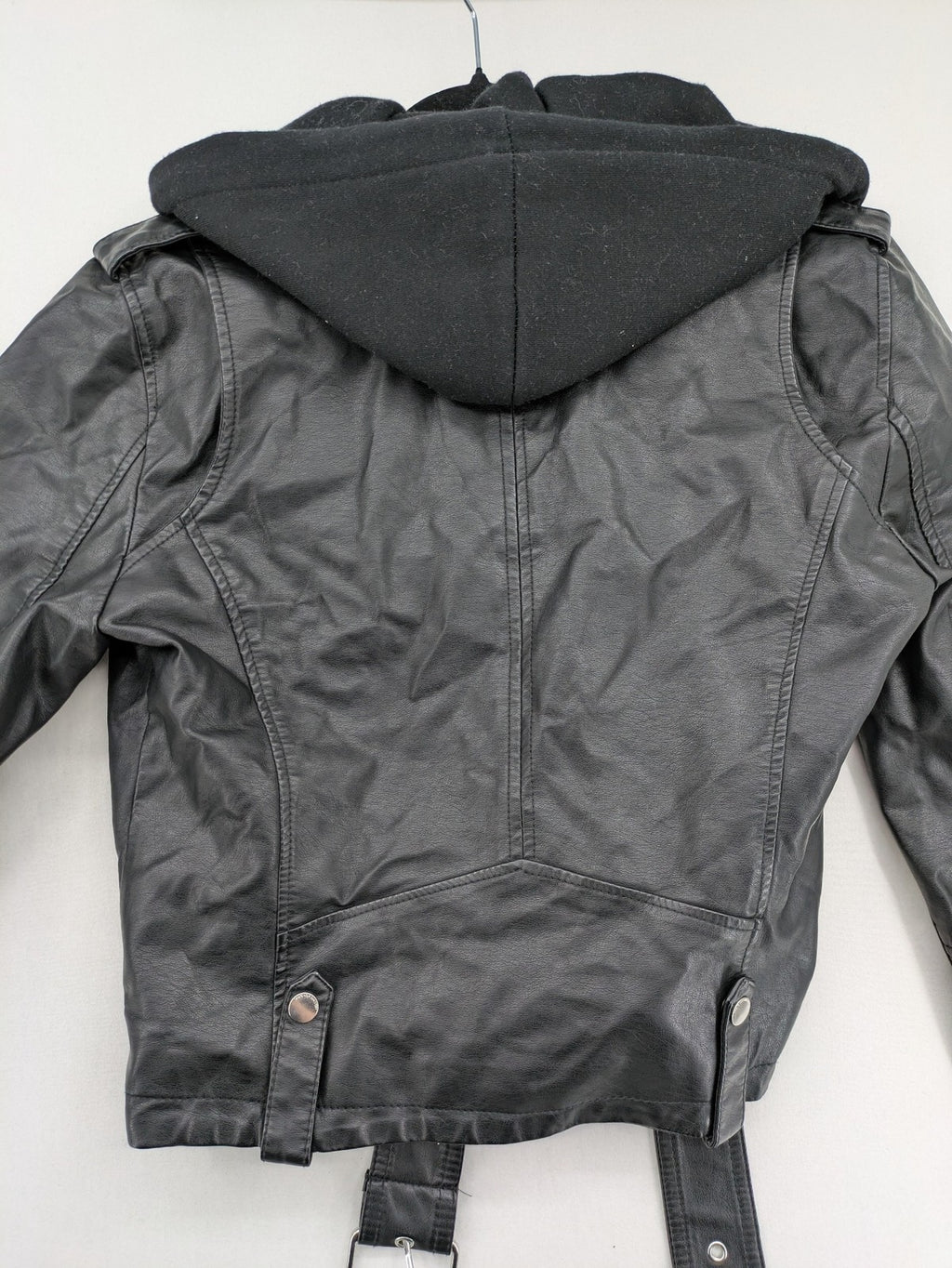 House Brand black biker jacket with hood, asymmetrical zipper, and belt detail.