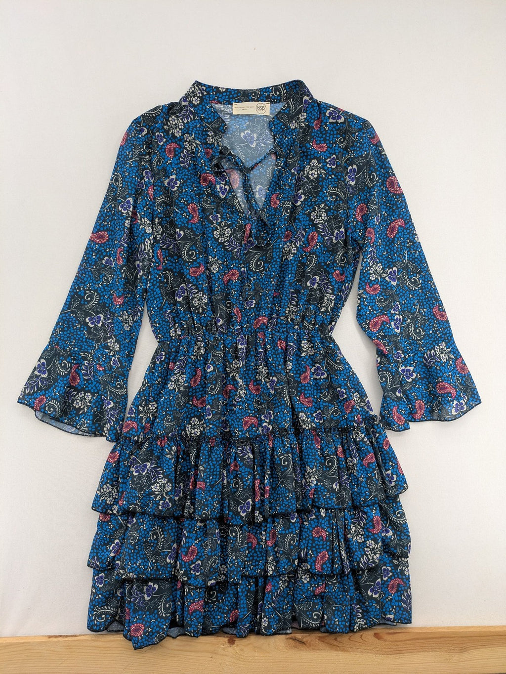 BSB multi-coloured bridal party dress with floral paisley pattern and ruffled hem.