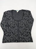 Simply The Best black top with white floral pattern and gathered front detail.