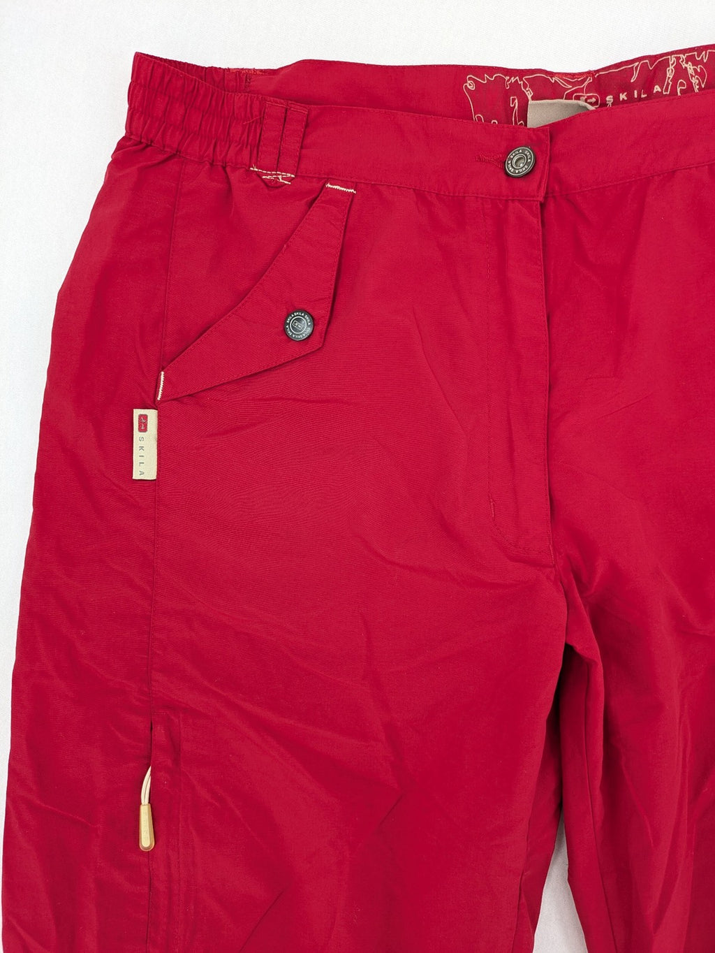 Skila red outdoor capri pants lightweight polyamide with adjustable drawstrings and pockets.