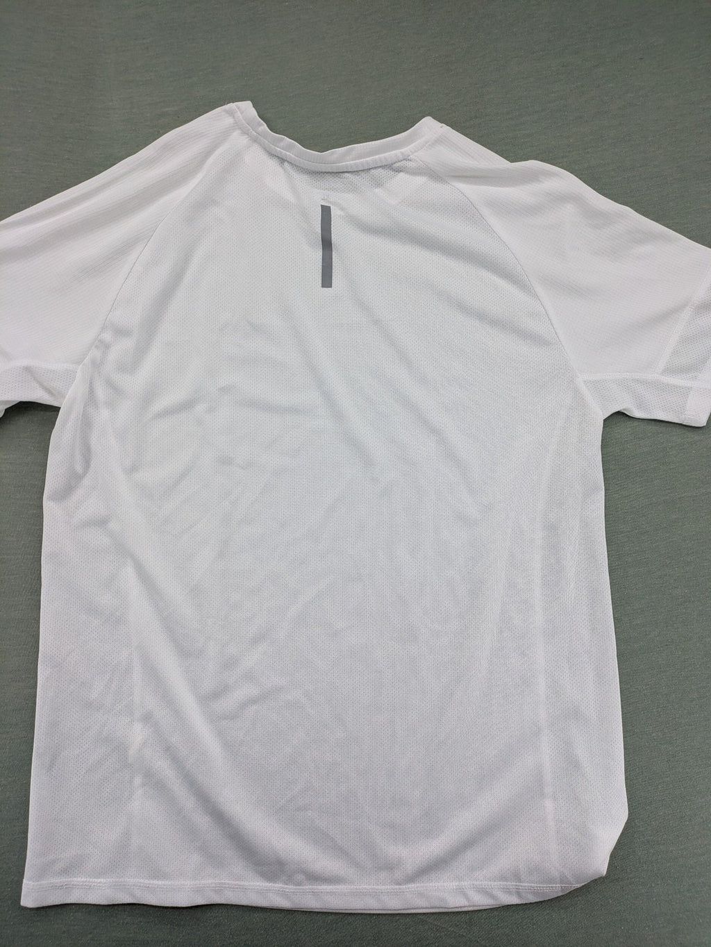 Smilodox white workout t-shirt with logo on chest and reflective detail on back.