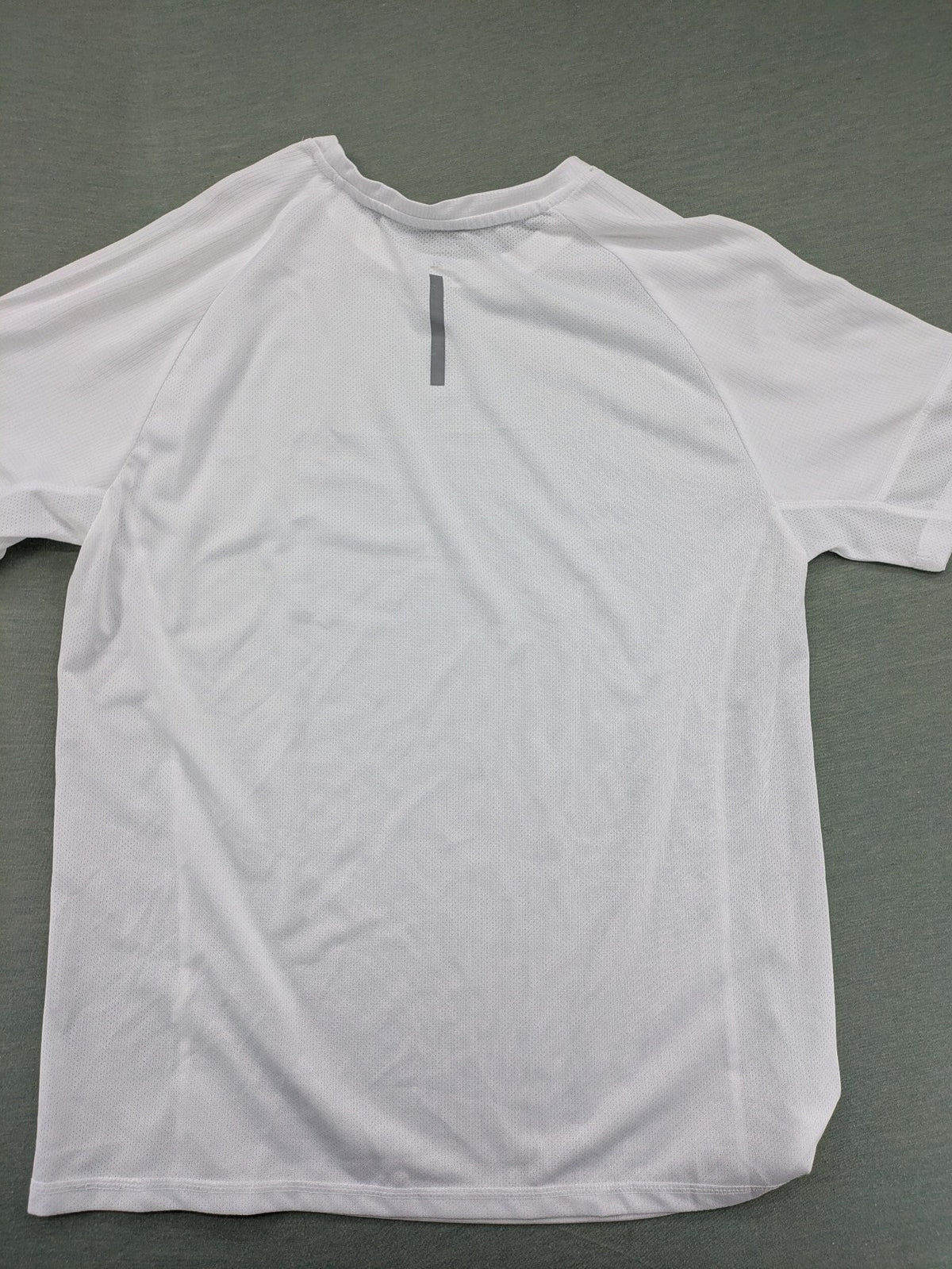 Smilodox white workout t-shirt with logo on chest and reflective detail on back.