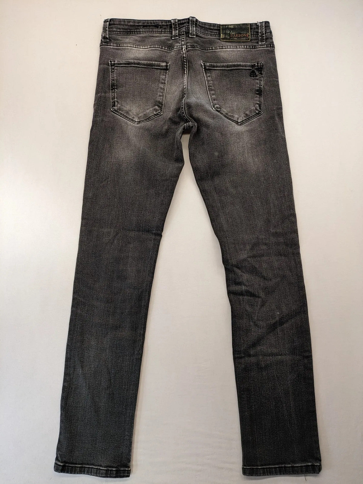 Denim grey straight jeans 5-pocket design with subtle brand details and zipper closure.