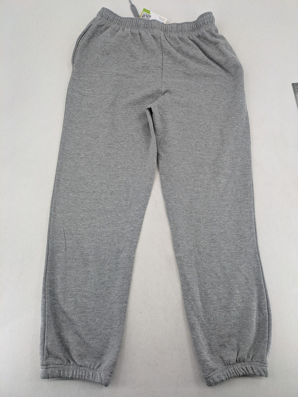 Skid Row grey joggers with red band logo, soft cotton blend, elastic waistband.