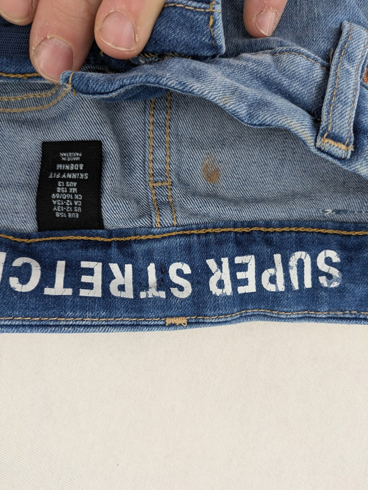 H&M blue skinny fit jeans, classic 5-pocket design, super stretch material.