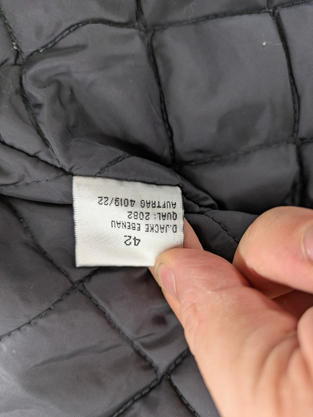 Outback orange outdoor jacket size 42 with reflective accents and mixed color details.