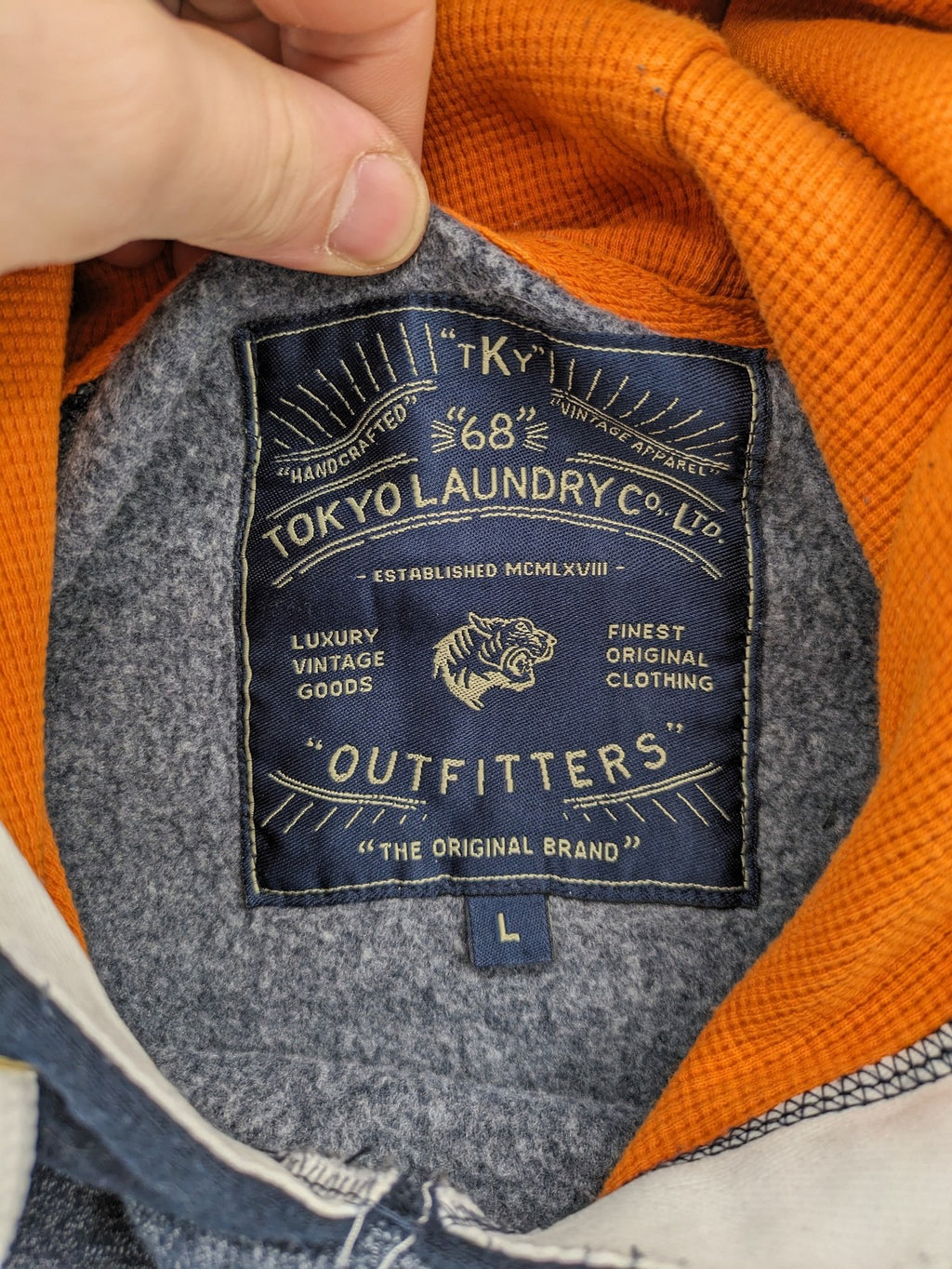 Tokyo Laundry orange zip-through hoodie with vintage graphic print and contrasting hood lining.