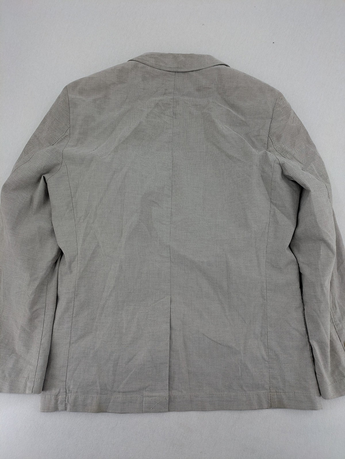 Camel Active grey cord blazer with classic two-button closure and practical zippered inner pockets.