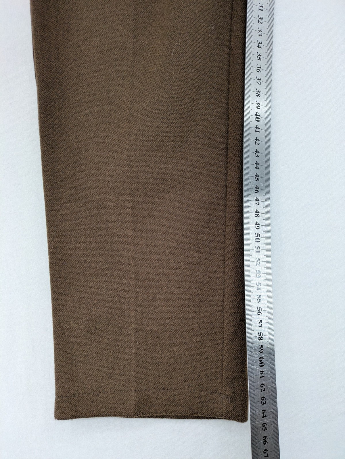 Liuliu pink high waist pants with pleats, side pockets, and classic design.