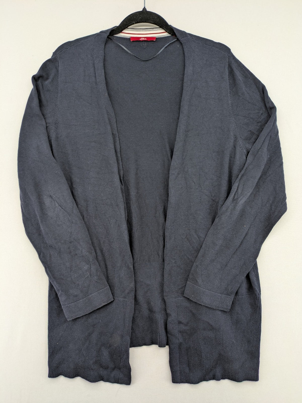 s.Oliver green turtle neck jumper soft viscose blend with ribbed cuffs and subtle logo.