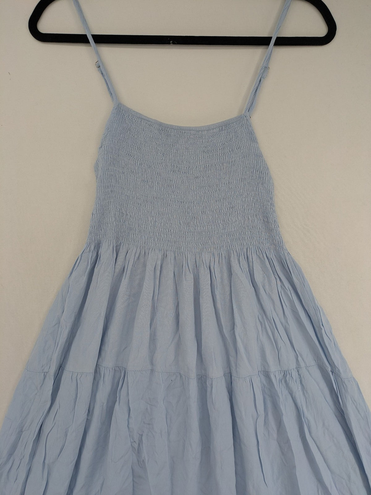 Ebelove blue summer dress with smocked bodice and adjustable spaghetti straps.