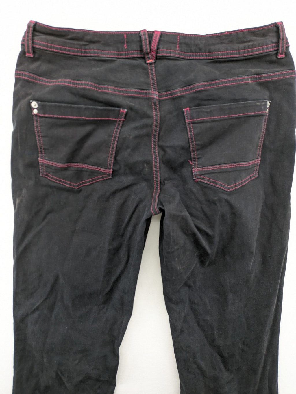 Denim black straight jeans with pink contrast stitching and classic 5-pocket style.