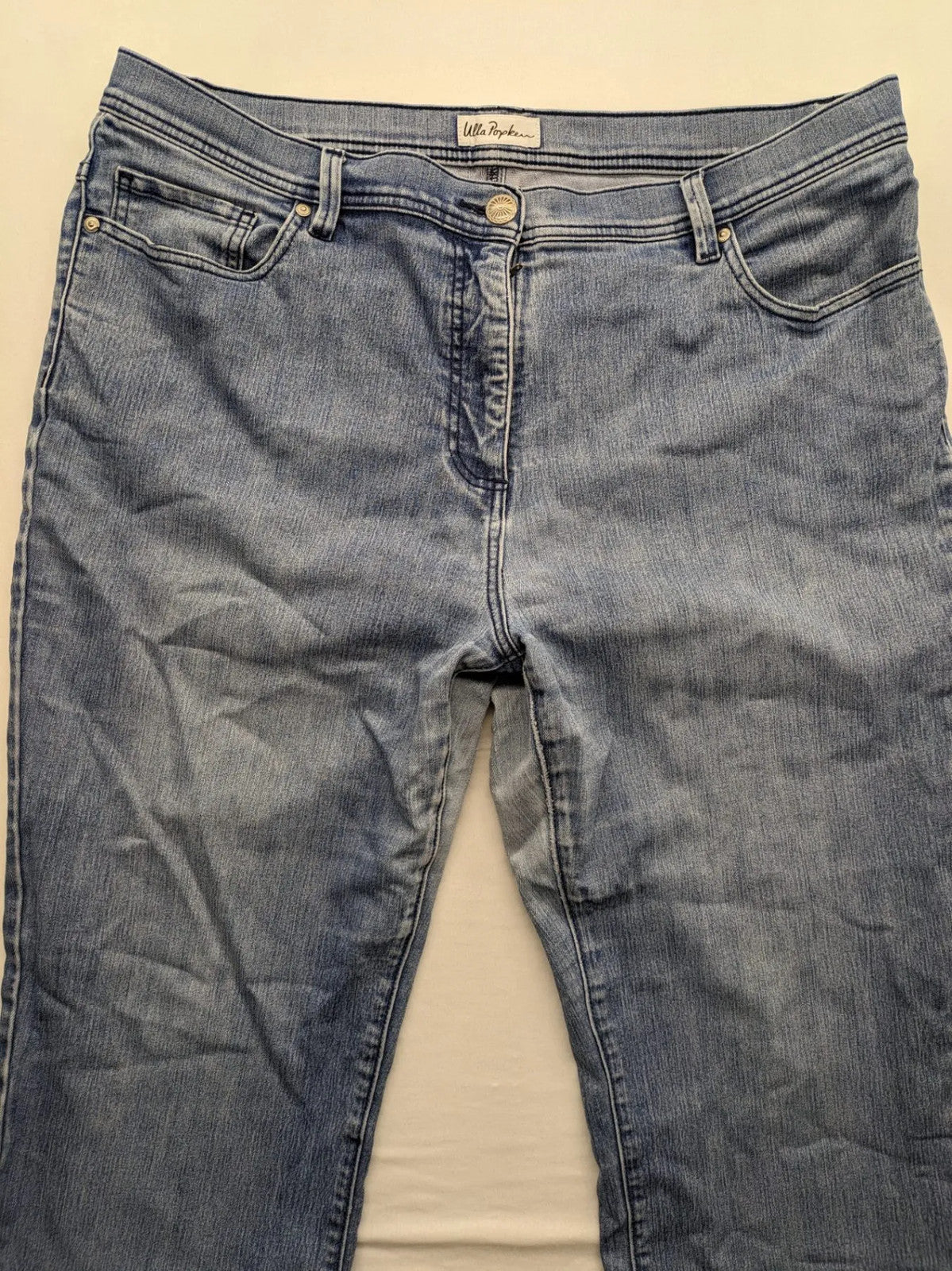Angels blue straight jeans with five-pocket design and vertical front seams.