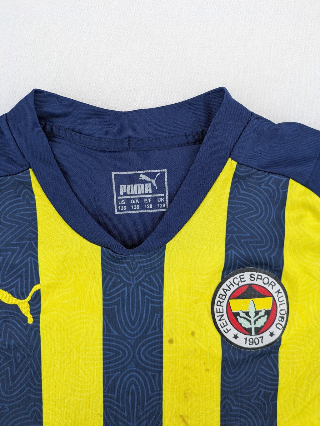 Puma Fenerbahçe kids jersey navy yellow with striped pattern and embroidered club logo.