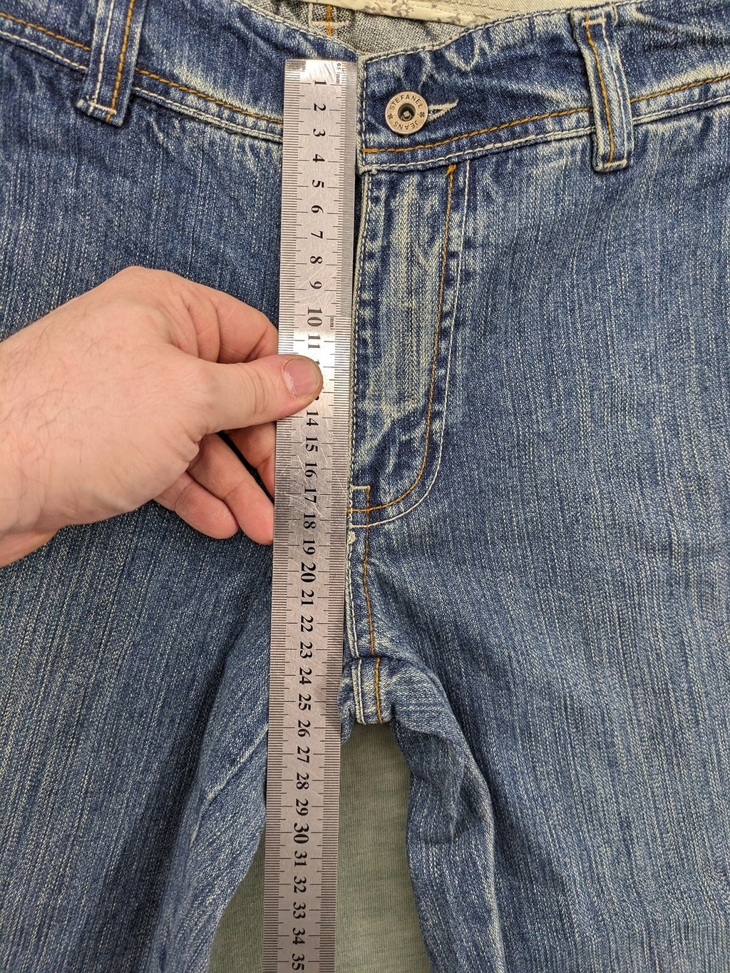 Stefanel blue straight jeans with cuffed hem and classic 5-pocket design.