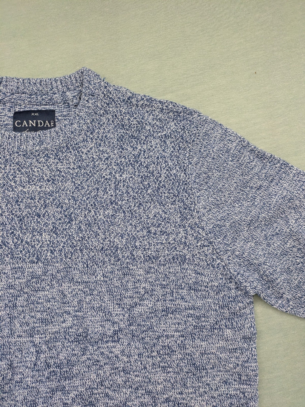 Canda blue-grey melange turtle neck jumper with long sleeves and round neckline.