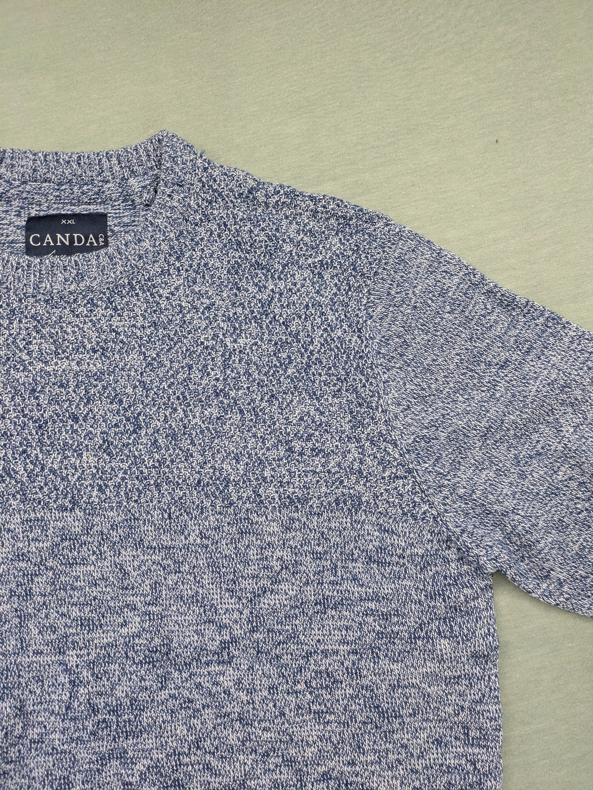 Canda blue-grey melange turtle neck jumper with long sleeves and round neckline.
