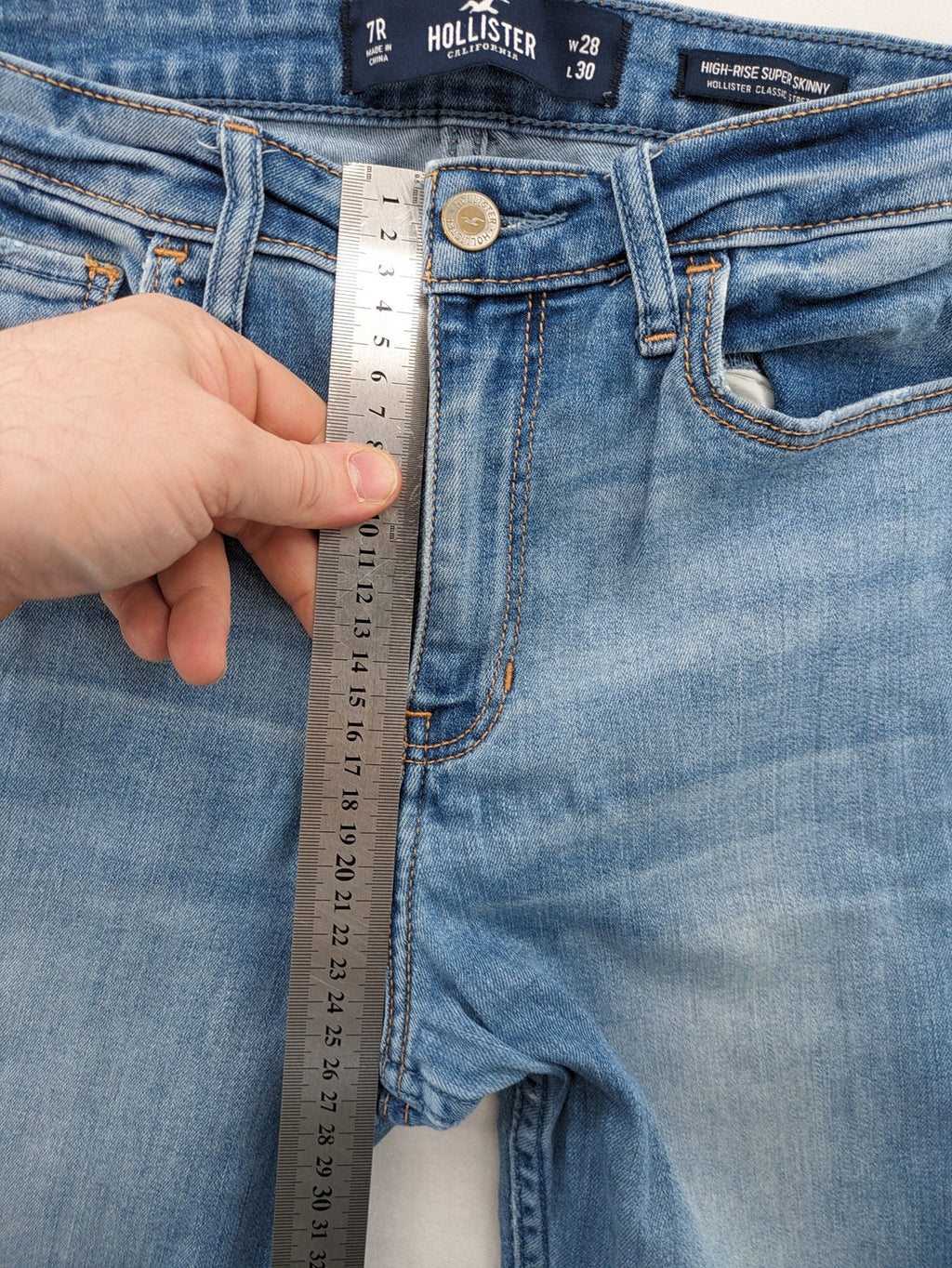 Hollister blue high rise super skinny jeans with frayed hem and classic stretch denim.