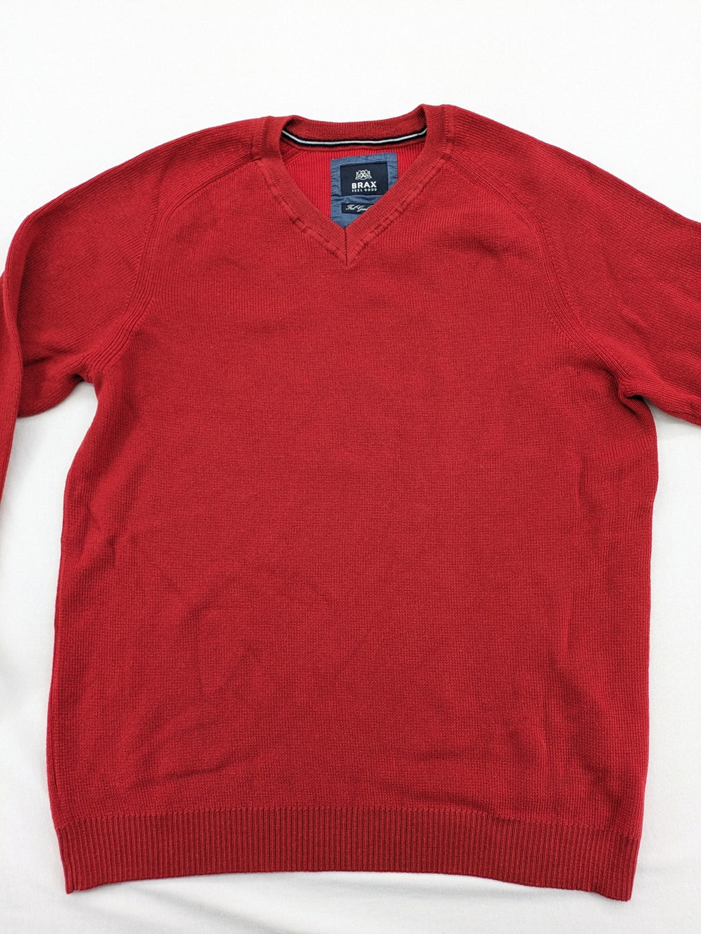 BRAX red turtle neck jumper V-neck design made from merino wool and cotton blend.
