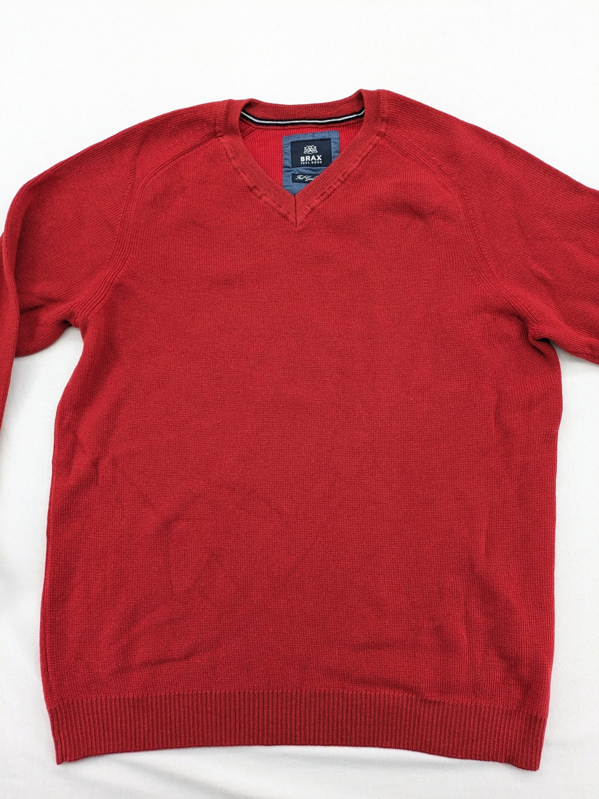 BRAX red turtle neck jumper V-neck design made from merino wool and cotton blend.