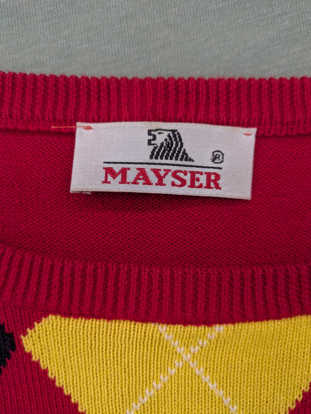 MAYSER multi turtle neck jumper argyle pattern in red, yellow, and black cotton.
