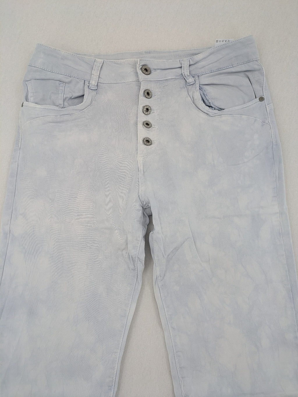 Yelly&Co blue and white batik pants with button fly, made from soft stretch fabric.