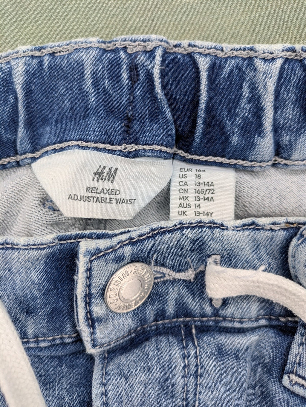 H&M blue straight jeans relaxed fit with adjustable elastic waistband and drawstring.