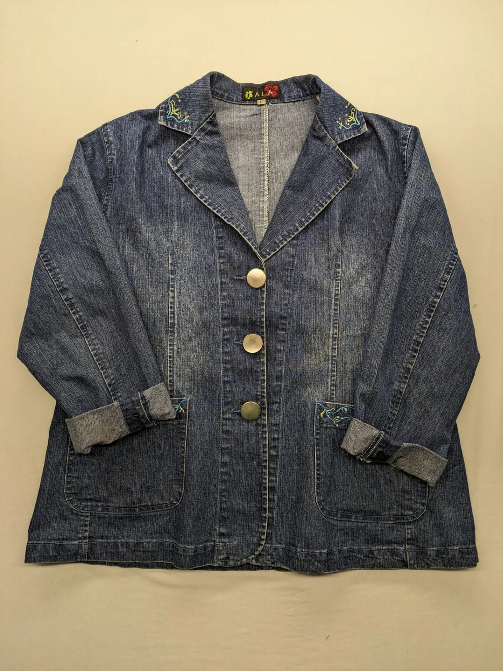 Zala blue denim blazer jacket with embroidered details and classic button closure.
