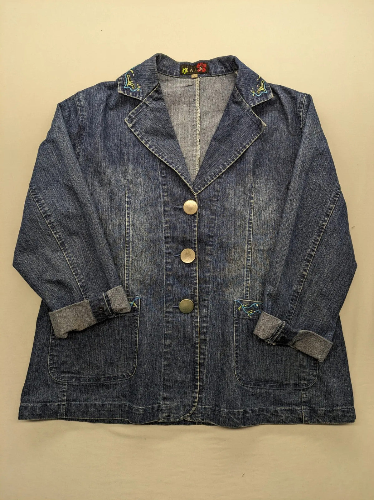 Zala blue denim blazer jacket with embroidered details and classic button closure.